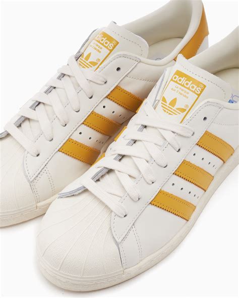 adidas superstar wit geel|White Superstar Shoes .